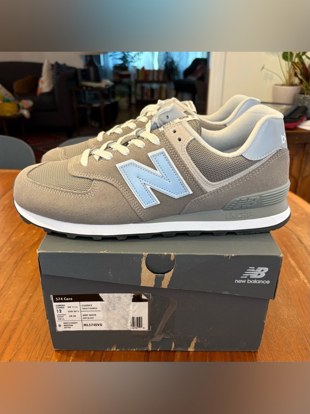 Brand new, never worn! Men’s New Balance 574 Core in Grey.  Size 12.